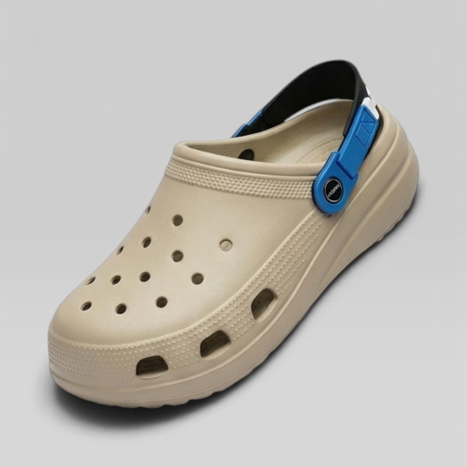 Beige clog shoe with a blue strap on a gray background